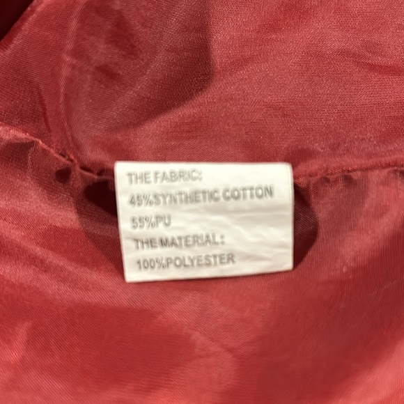 New perfect condition red faux leather jacket. Adorned with zippers and snaps. - Picture 3 of 8